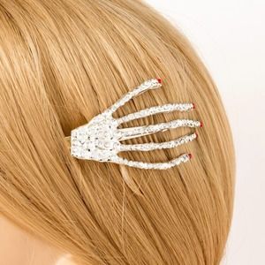 Gold rhinestone skull clip